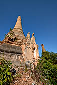 Inle Lake Myanmar. Indein, a cluster of ancient stupas  ruined and overgrown with bushes, just behind the village. 